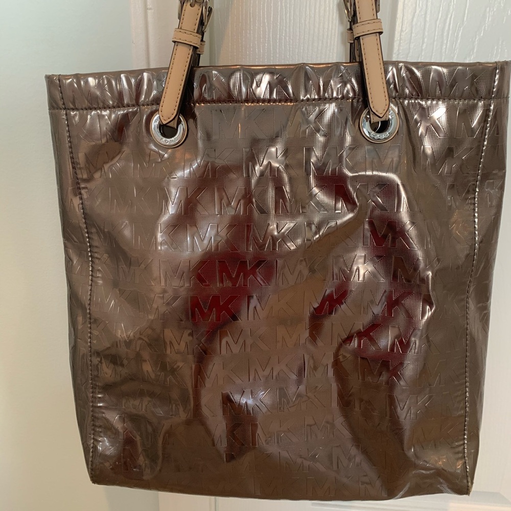 Michael Kors Metallic Foil Tote Bag! Great size, with several small pockets.